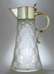 GERMAN SILVER AND CLARET JUGS