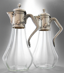 GERMAN SILVER AND CLARET JUGS