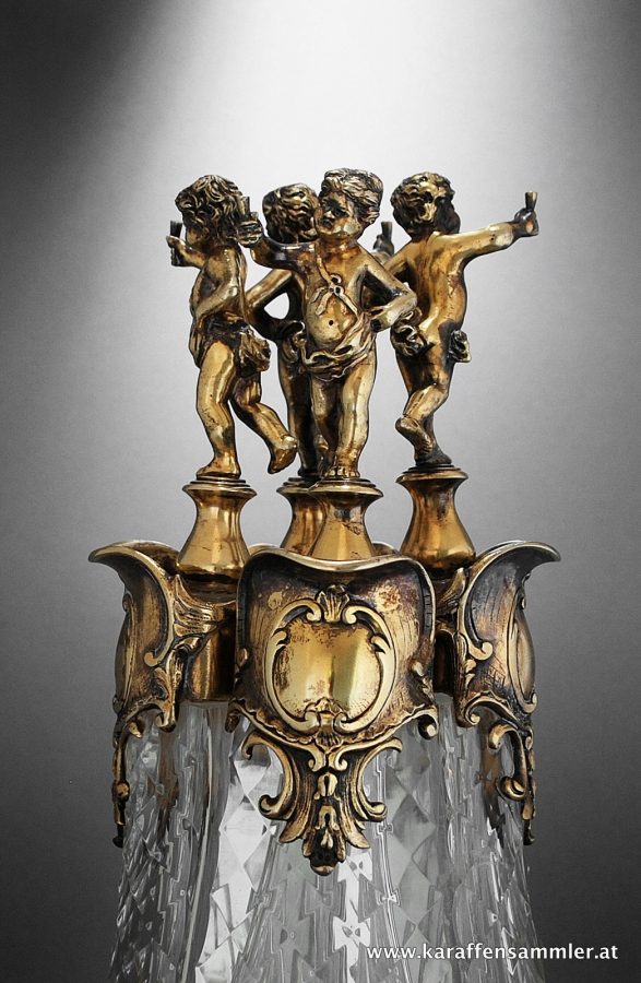 finials shaped as cherubs